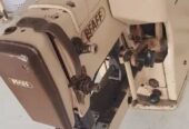 Machine acoudre liquidation